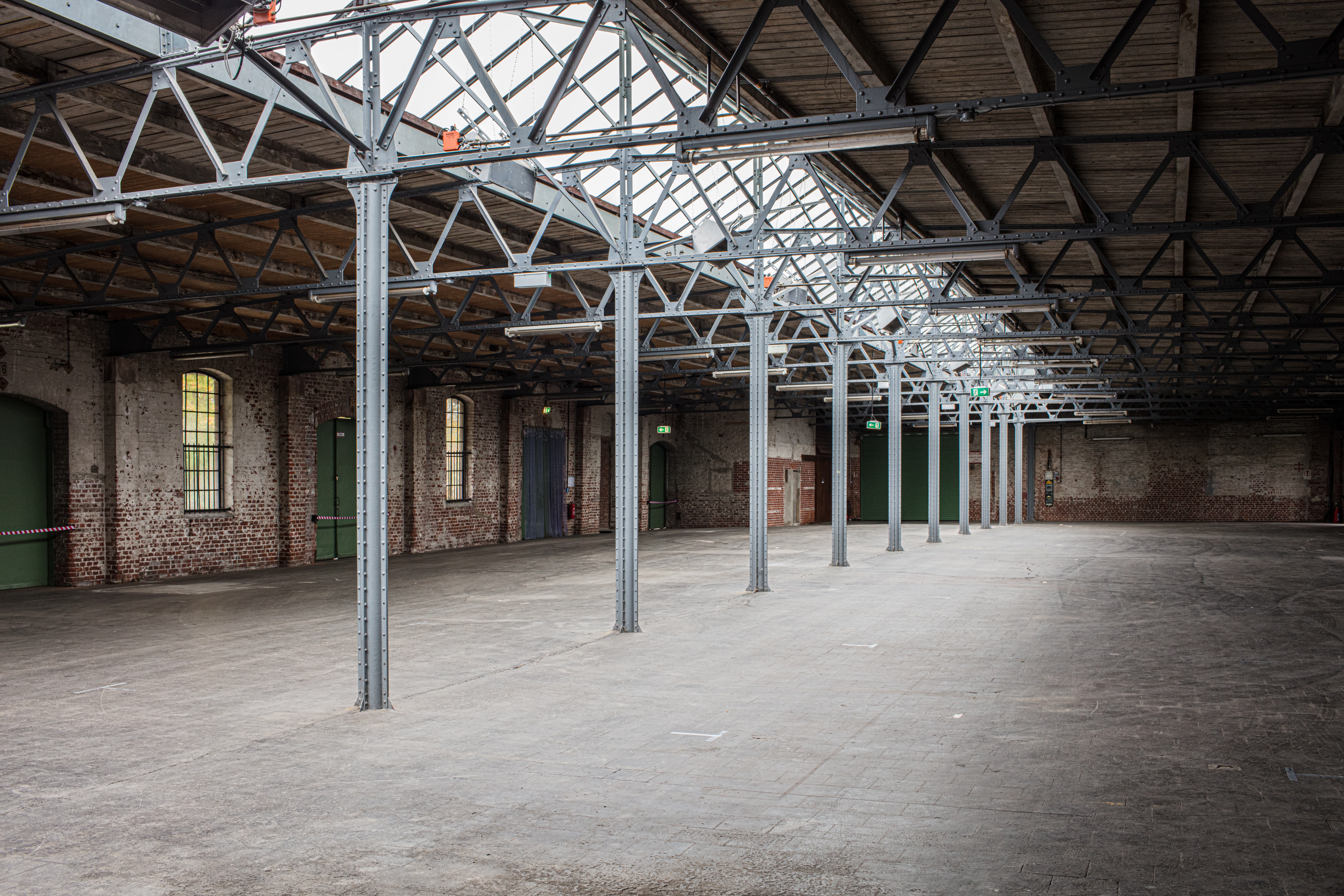 An empty warehouse with iron beams